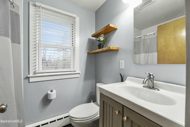 24 Henderson Rd, Williamstown, MA 01267 - bathroom with vanity, visible vents, baseboard heating, curtained shower, and toilet