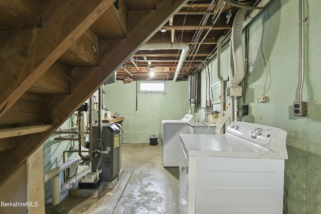 24 Henderson Rd, Williamstown, MA 01267 - clothes washing area with separate washer and dryer, laundry area, and a heating unit