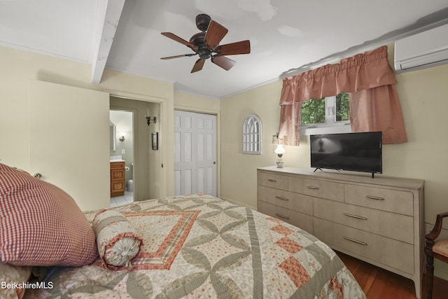 545 Leisure Lee Rd, Lee, MA 01238 - bedroom with a wall unit AC, wood finished floors, a closet, a ceiling fan, and connected bathroom
