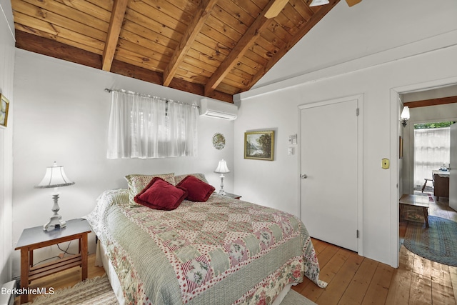 545 Leisure Lee Rd, Lee, MA 01238 - bedroom featuring a wall unit AC, wood-type flooring, a wooden ceiling with exposed beams, and high vaulted ceiling