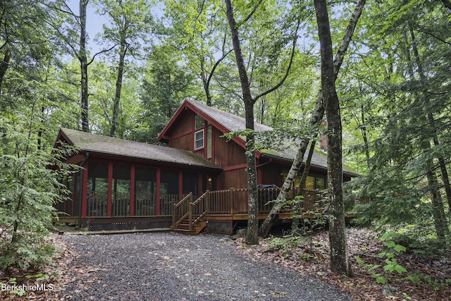 545 Leisure Lee Rd, Lee, MA 01238 - view of front of house featuring a sunroom and a shingled roof