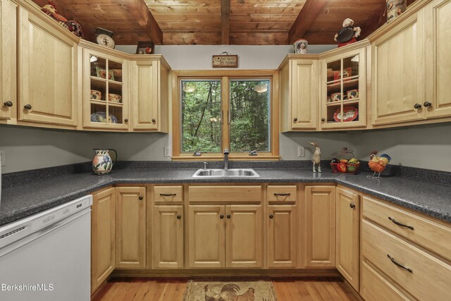 545 Leisure Lee Rd, Lee, MA 01238 - kitchen featuring white dishwasher, a wood ceiling with exposed beams, dark countertops, light wood-style floors, and glass insert cabinets