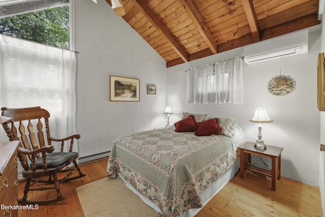 545 Leisure Lee Rd, Lee, MA 01238 - bedroom featuring a wall unit AC, wood ceiling, wood-type flooring, and baseboard heating