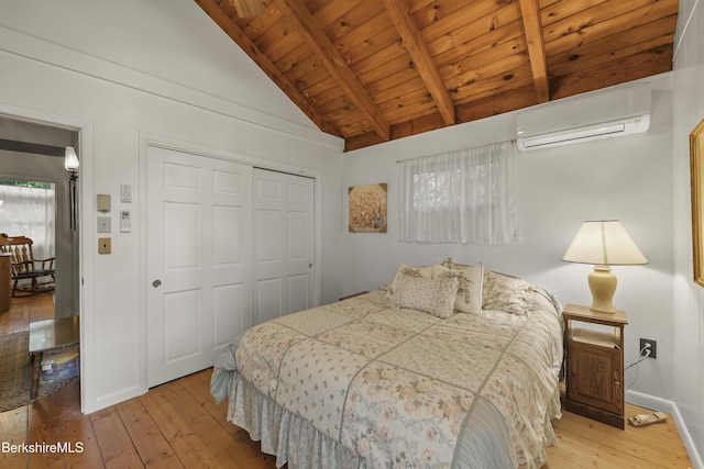 545 Leisure Lee Rd, Lee, MA 01238 - bedroom with a wall unit AC, wood ceiling, wood-type flooring, and a closet