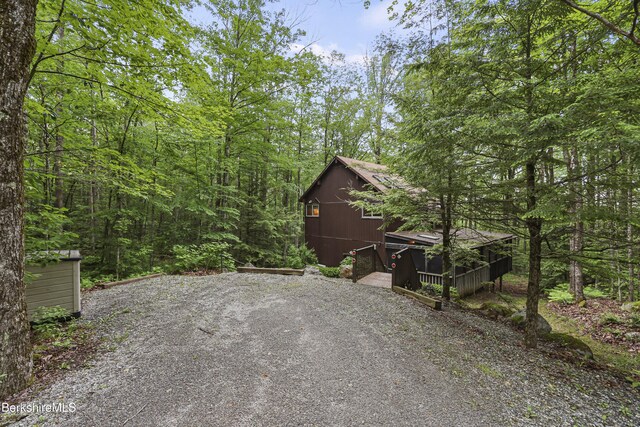 377 Highland Way, Sandisfield, MA 01255 - view of patio / terrace with a view of trees, an outdoor structure, and a barn