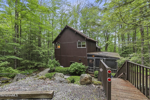 377 Highland Way, Sandisfield, MA 01255 - rear view of house featuring a sunroom