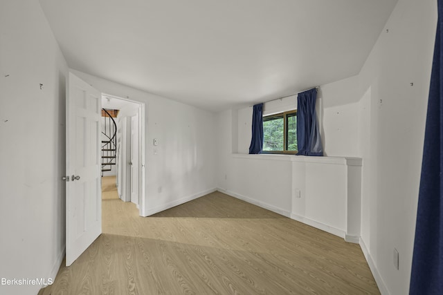 377 Highland Way, Sandisfield, MA 01255 - unfurnished room with wood finished floors and baseboards
