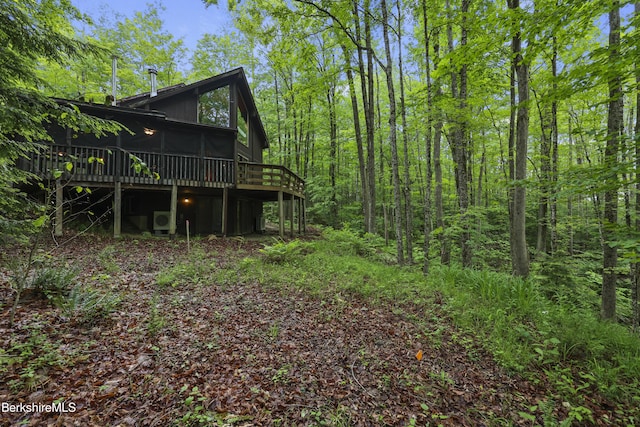 377 Highland Way, Sandisfield, MA 01255 - back of property with a deck and a sunroom