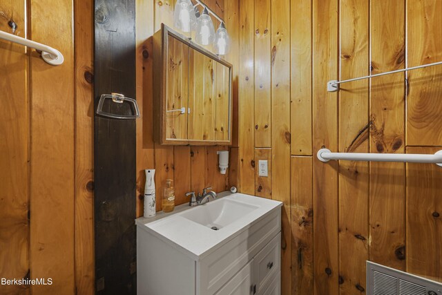 377 Highland Way, Sandisfield, MA 01255 - bathroom featuring vanity and wooden walls