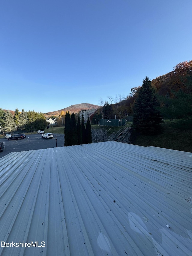 wooden terrace with a mountain view