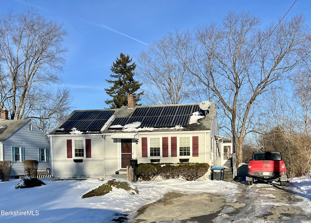 view of front of house with solar panels