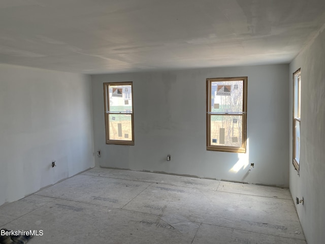 empty room featuring plenty of natural light