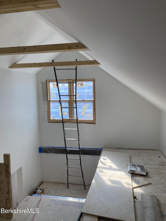 additional living space with lofted ceiling