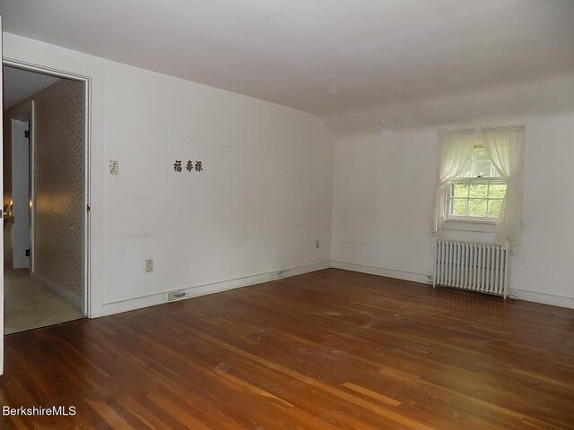 350 Laurel St, Lee, MA 01238 - spare room with radiator heating unit, hardwood / wood-style flooring, and baseboards