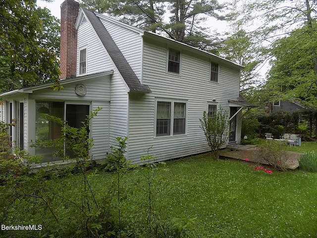 350 Laurel St, Lee, MA 01238 - view of side of property with a chimney, a lawn, and a shingled roof