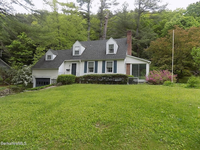 350 Laurel St, Lee, MA 01238 - new england style home featuring a chimney, a front lawn, a sunroom, a shingled roof, and a garage