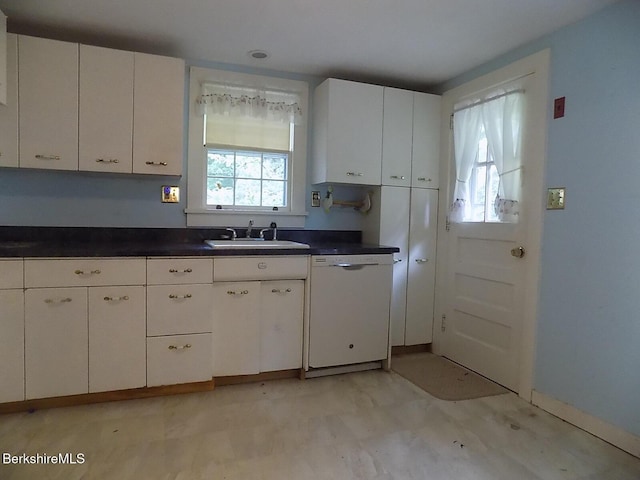 350 Laurel St, Lee, MA 01238 - kitchen featuring white dishwasher, a sink, white cabinetry, and dark countertops