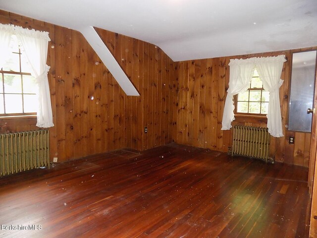 350 Laurel St, Lee, MA 01238 - bonus room with radiator heating unit, hardwood / wood-style flooring, lofted ceiling, and wood walls