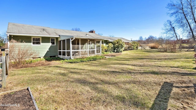 view of yard featuring a sunroom
