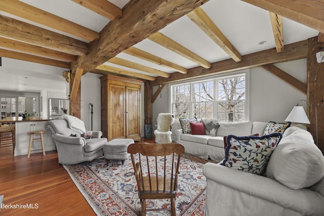 16 Glendale Middle Rd, Stockbridge, MA 01262 - living area featuring plenty of natural light, wood finished floors, and beam ceiling