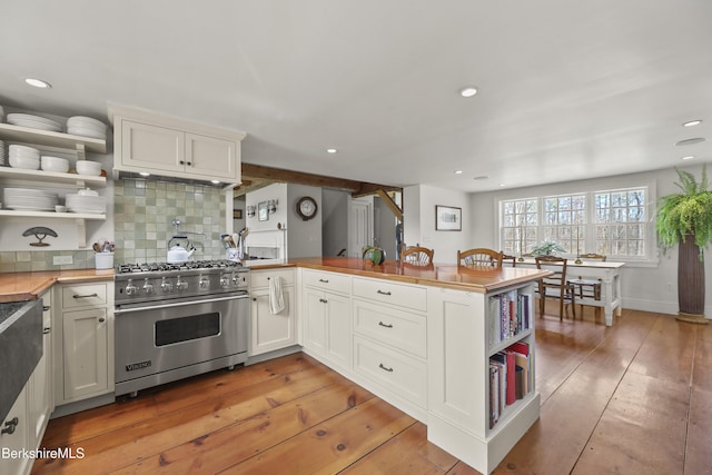 16 Glendale Middle Rd, Stockbridge, MA 01262 - kitchen featuring luxury range, open shelves, a peninsula, light wood-style floors, and recessed lighting