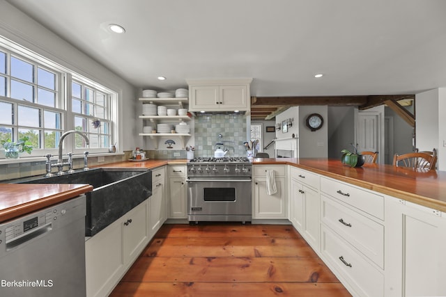 16 Glendale Middle Rd, Stockbridge, MA 01262 - kitchen with appliances with stainless steel finishes, a sink, hardwood / wood-style floors, recessed lighting, and white cabinetry