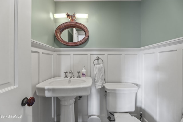 16 Glendale Middle Rd, Stockbridge, MA 01262 - bathroom with a decorative wall, a wainscoted wall, and toilet
