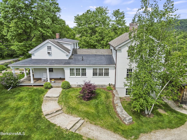 16 Glendale Middle Rd, Stockbridge, MA 01262 - view of front of property featuring a chimney, a front lawn, a porch, and a shingled roof