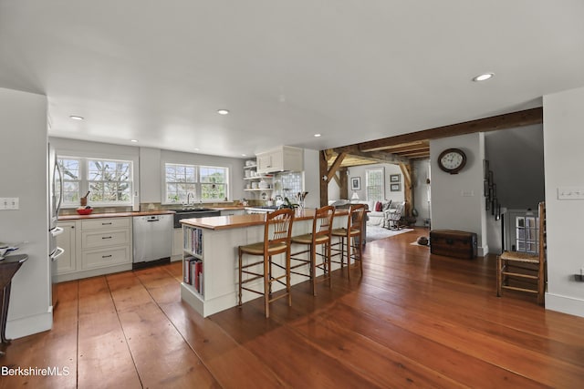 16 Glendale Middle Rd, Stockbridge, MA 01262 - kitchen featuring dishwasher, open shelves, hardwood / wood-style flooring, a breakfast bar, and recessed lighting