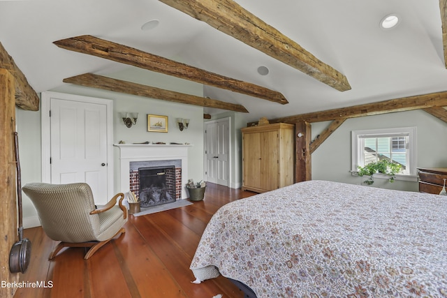 16 Glendale Middle Rd, Stockbridge, MA 01262 - bedroom with a brick fireplace, dark wood-style flooring, and recessed lighting