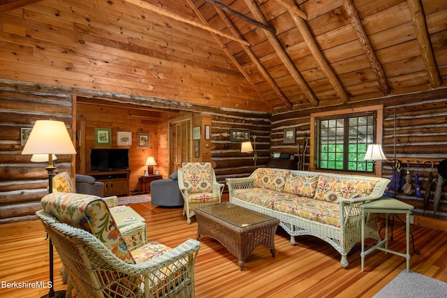 411 Bressett Rd, Williamstown, MA 01267 - living area with rustic walls, wooden ceiling with exposed beams, hardwood / wood-style flooring, high vaulted ceiling, and wood walls