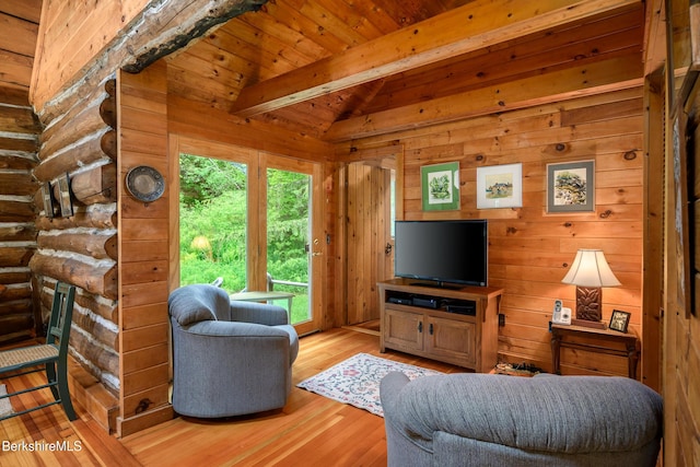 411 Bressett Rd, Williamstown, MA 01267 - living area with hardwood / wood-style flooring, wooden ceiling, and rustic walls