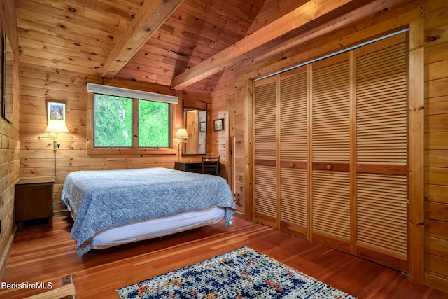 411 Bressett Rd, Williamstown, MA 01267 - bedroom with wooden walls, wood finished floors, wood ceiling, and a closet