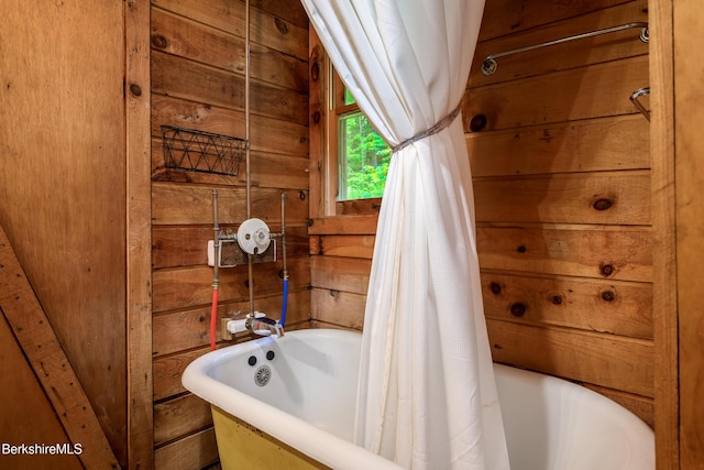 411 Bressett Rd, Williamstown, MA 01267 - bathroom featuring a bath and wood walls