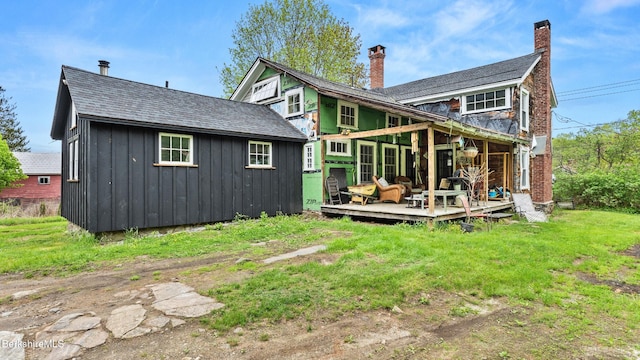32 S Main Rd, Otis, MA 01253 - back of house featuring a wooden deck, board and batten siding, and a chimney