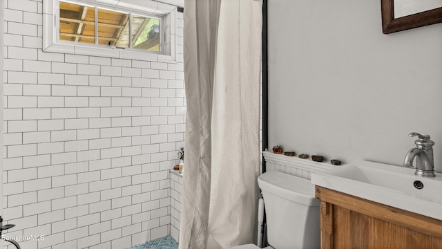 32 S Main Rd, Otis, MA 01253 - bathroom featuring toilet, tiled shower, and vanity