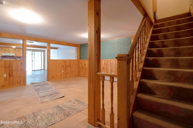 1057 Main St, Great Barrington, MA 01236 - stairs with carpet, wooden walls, and wainscoting