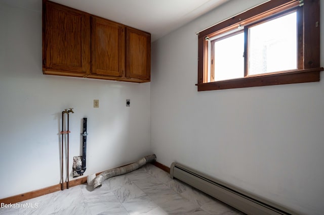 1057 Main St, Great Barrington, MA 01236 - washroom featuring a baseboard radiator, electric dryer hookup, cabinet space, and baseboards