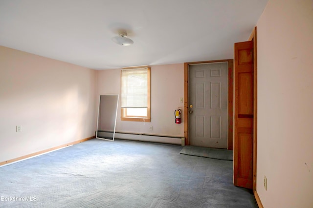 1057 Main St, Great Barrington, MA 01236 - carpeted spare room featuring a baseboard heating unit and baseboards