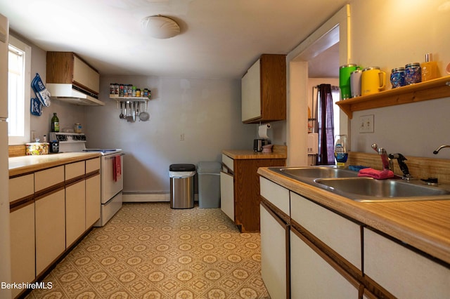 1057 Main St, Great Barrington, MA 01236 - kitchen with white electric stove, open shelves, a baseboard heating unit, exhaust hood, and a sink