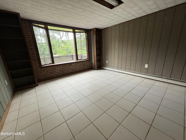 153 Dugway Rd, Lenox, MA 01240 - unfurnished room with a baseboard radiator and wood walls