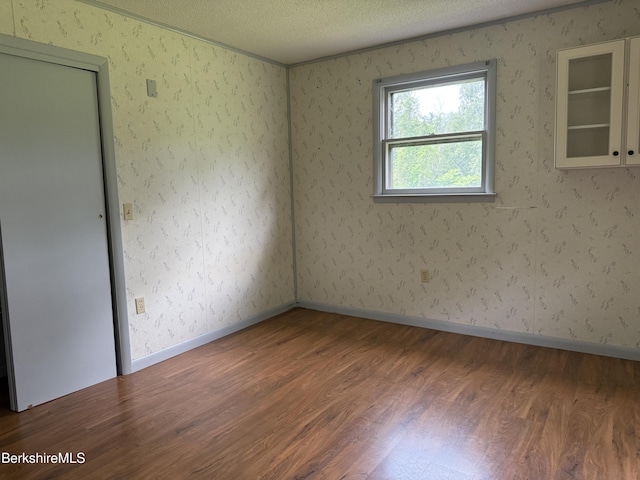 153 Dugway Rd, Lenox, MA 01240 - empty room featuring wood finished floors and a textured ceiling