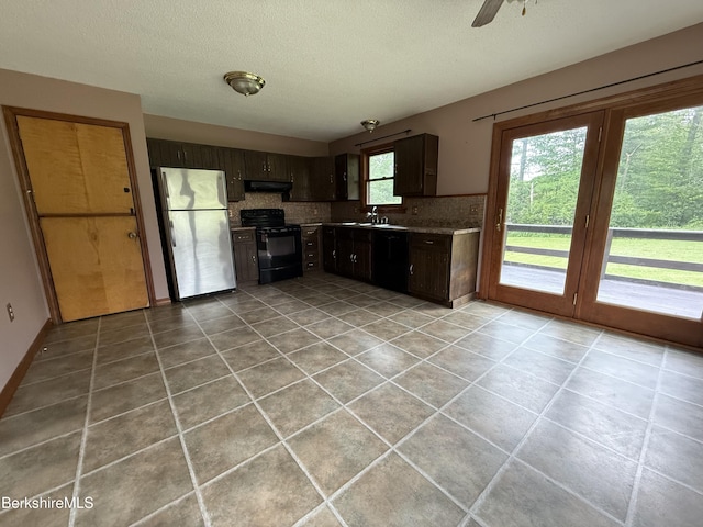 153 Dugway Rd, Lenox, MA 01240 - kitchen featuring black appliances, exhaust hood, decorative backsplash, light tile patterned floors, and a textured ceiling