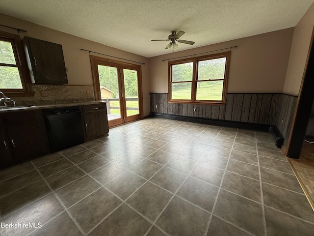 153 Dugway Rd, Lenox, MA 01240 - kitchen with dishwasher, wainscoting, a ceiling fan, a textured ceiling, and dark countertops