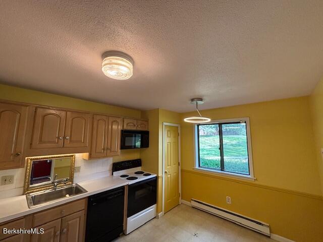 53 Churchill Crst Unit 53, Pittsfield, MA 01201 - kitchen featuring black appliances, a baseboard radiator, light countertops, backsplash, and a textured ceiling
