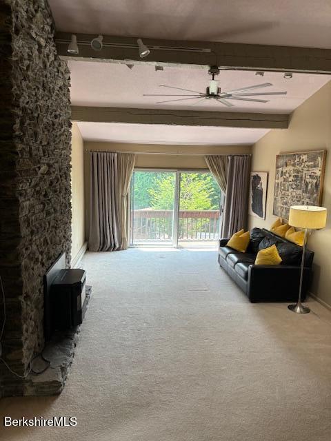 53 Churchill Crst Unit 53, Pittsfield, MA 01201 - living room featuring carpet and beam ceiling