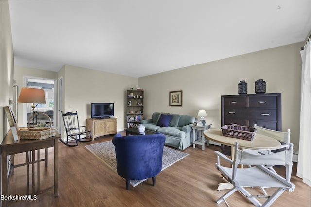 living room with wood finished floors