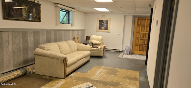 364 Otis Rd, Becket, MA 01223 - sitting room with a drop ceiling, baseboard heating, concrete floors, a wainscoted wall, and wood walls
