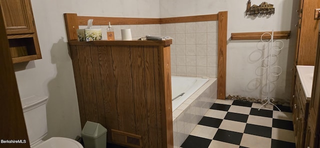 364 Otis Rd, Becket, MA 01223 - bathroom featuring a relaxing tiled tub, vanity, and tile patterned floors