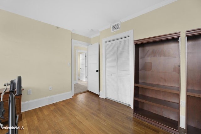 bedroom featuring hardwood / wood-style flooring